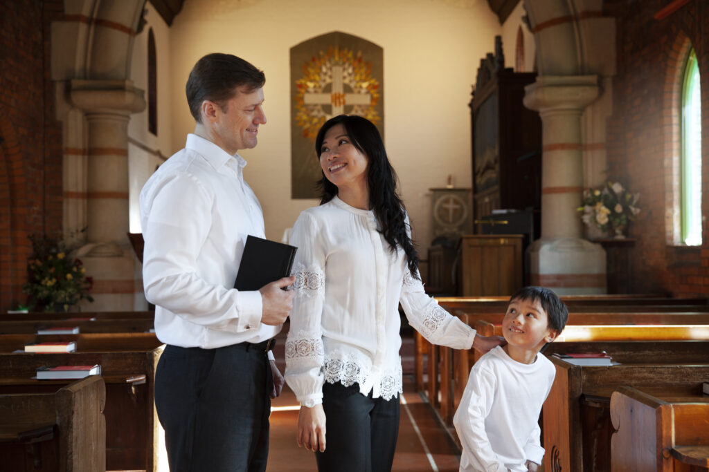 medium shot happy christian family church